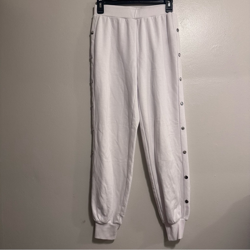 Jennifer Lopez White Track Pants with Button Detail